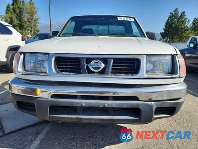 Piąte zdjęcie samochodu w środku: 1999 NISSAN FRONTIER XE VIN:1N6DD26S8XC323177 - miniatura