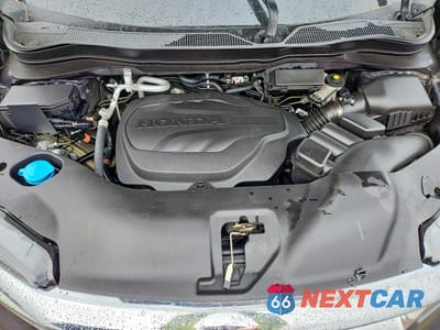 Zdjęcie 12 z 13 samochodu: 2022 HONDA PILOT TOURING VIN:5FNYF5H67NB029186 - miniatura