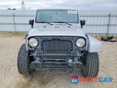 Piąte zdjęcie samochodu w środku: 2013 JEEP WRANGLER UNLIMITED SAHARA VIN:1C4BJWEG8DL578057 - miniatura