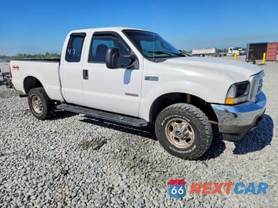 Czwarte zdjęcie samochodu z boku: 2004 FORD F350 SRW SUPER DUTY VIN:1FTSX31P84ED81073 - miniatura