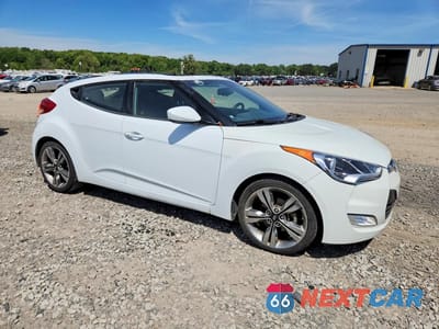 Czwarte zdjęcie samochodu z boku: 2017 HYUNDAI VELOSTER VALUE EDITION VIN:KMHTC6AD7HU320554 - miniatura