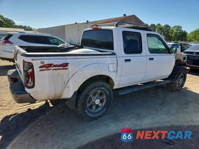 Trzecie zdjęcie samochodu z tyłu: 2003 NISSAN FRONTIER XE-V6 VIN:1N6ED27Y63C439981 - miniatura