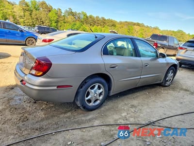 Trzecie zdjęcie samochodu z tyłu: 2002 OLDSMOBILE AURORA VIN:1G3GR64H124245103 - miniatura