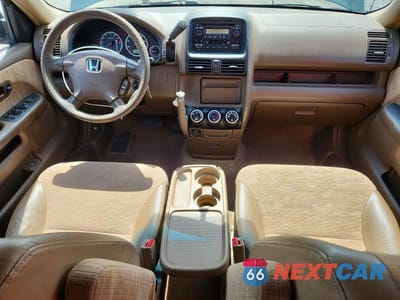 Zdjęcie 8 z 13 samochodu: 2002 HONDA CR-V LX VIN:JHLRD78432C075632 - miniatura