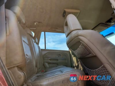 Zdjęcie 11 z 12 samochodu: 2004 HONDA PILOT EXL VIN:2HKYF18604H575661 - miniatura