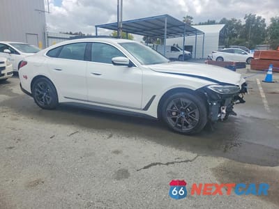 Czwarte zdjęcie samochodu z boku: 2024 BMW I4 XDRIVE 40 VIN:WBY83FB00RFR88965 - miniatura