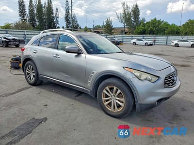 Czwarte zdjęcie samochodu z boku: 2010 INFINITI FX35 BASE VIN:JN8AS1MW7AM852461 - miniatura
