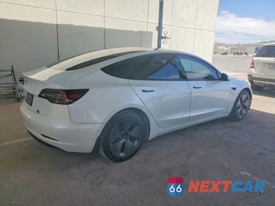 Trzecie zdjęcie samochodu z tyłu: 2021 TESLA MODEL 3 VIN:5YJ3E1EA2MF917311 - miniatura