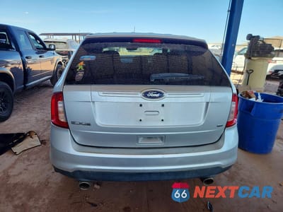 Zdjęcie 6 z 14 samochodu: 2013 FORD EDGE SE VIN:2FMDK4GC1DBA28876 - miniatura