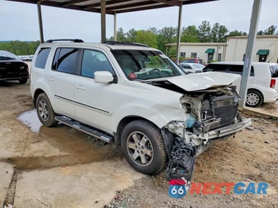 Czwarte zdjęcie samochodu z boku: 2011 HONDA PILOT TOURING VIN:5FNYF3H99BB044119 - miniatura