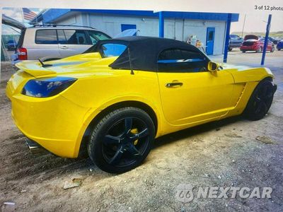 Czwarte zdjęcie samochodu z boku: 2009 SNOWEX SKY VIN:1G8MN35B39Y106191 - miniatura