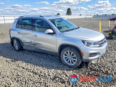 Czwarte zdjęcie samochodu z boku: 2017 VOLKSWAGEN TIGUAN WOLFSBURG VIN:WVGSV7AX0HK005936 - miniatura