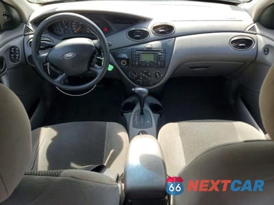 Zdjęcie 8 z 12 samochodu: 2003 FORD FOCUS SE COMFORT VIN:1FAFP34333W198043 - miniatura