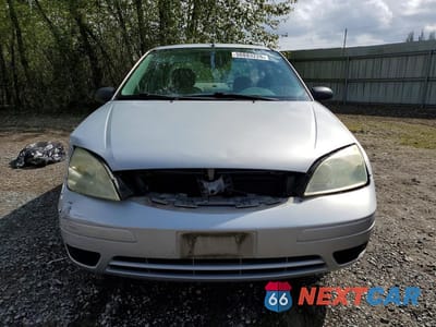 Piąte zdjęcie samochodu w środku: 2005 FORD FOCUS ZX4 VIN:1FAFP34N15W238270 - miniatura