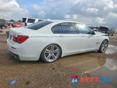 Trzecie zdjęcie samochodu z tyłu: 2014 BMW 740 I VIN:WBAYA6C50ED144154 - miniatura