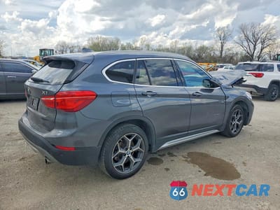 Trzecie zdjęcie samochodu z tyłu: 2017 BMW X1 XDRIVE28I VIN:WBXHT3C31H5F73737 - miniatura