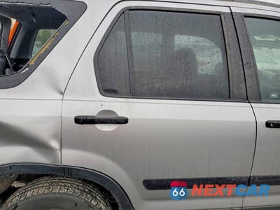 Zdjęcie 11 z 13 samochodu: 2003 HONDA CR-V EX VIN:JHLRD77843C031595 - miniatura