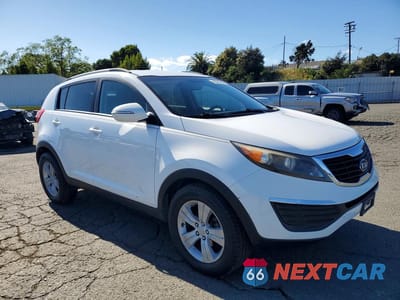 Czwarte zdjęcie samochodu z boku: 2011 KIA SPORTAGE LX VIN:KNDPB3A21B7174115 - miniatura