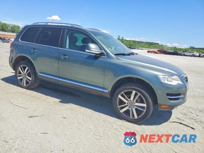 Czwarte zdjęcie samochodu z boku: 2008 VOLKSWAGEN TOUAREG 2 V6 VIN:WVGBE77L48D026281 - miniatura