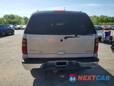 Zdjęcie 6 z 13 samochodu: 2004 GMC YUKON XL K1500 VIN:1GKFK16Z14J182537 - miniatura