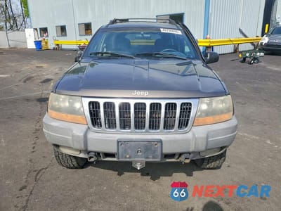 Piąte zdjęcie samochodu w środku: 1999 JEEP GRAND CHEROKEE LAREDO VIN:1J4GW58N9XC804505 - miniatura