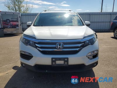 Piąte zdjęcie samochodu w środku: 2016 HONDA PILOT EXL VIN:5FNYF5H59GB036649 - miniatura