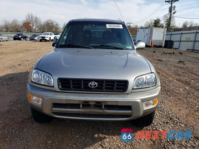 Piąte zdjęcie samochodu w środku: 2000 TOYOTA RAV4 BASE VIN:JT3HP10V0Y7170835 - miniatura