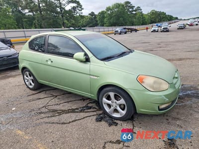 Czwarte zdjęcie samochodu z boku: 2007 HYUNDAI ACCENT SE VIN:KMHCN36C37U008559 - miniatura