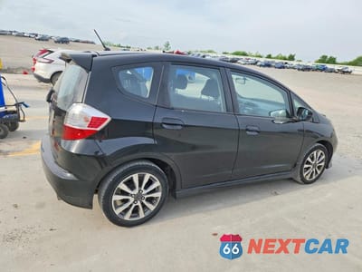 Trzecie zdjęcie samochodu z tyłu: 2013 HONDA FIT SPORT VIN:JHMGE8G54DC049074 - miniatura