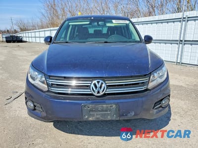 Piąte zdjęcie samochodu w środku: 2013 VOLKSWAGEN TIGUAN S VIN:WVGKV3AX9DW577714 - miniatura