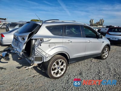 Trzecie zdjęcie samochodu z tyłu: 2014 FORD ESCAPE TITANIUM VIN:1FMCU0J90EUB16275 - miniatura