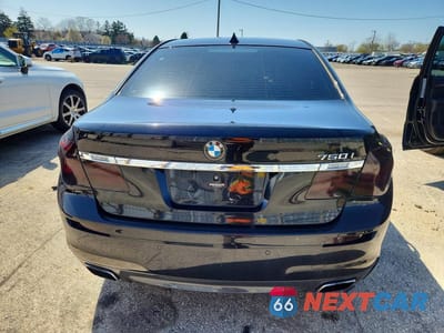 Zdjęcie 6 z 12 samochodu: 2014 BMW 750 I VIN:WBAYA8C55ED499865 - miniatura