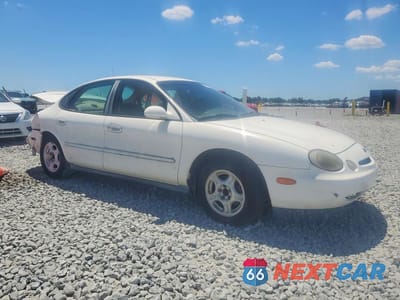 Czwarte zdjęcie samochodu z boku: 1996 FORD TAURUS GL VIN:1FALP52U4TA289250 - miniatura