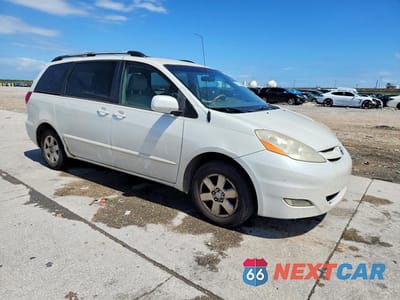 Czwarte zdjęcie samochodu z boku: 2009 TOYOTA SIENNA XLE VIN:5TDZK22C89S239441 - miniatura