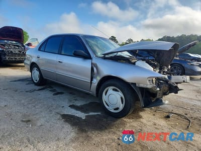 Czwarte zdjęcie samochodu z boku: 1998 TOYOTA COROLLA VE VIN:2T1BR18E4WC003602 - miniatura