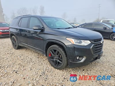Czwarte zdjęcie samochodu z boku: 2018 CHEVROLET TRAVERSE PREMIER VIN:1GNEVJKW7JJ109055 - miniatura