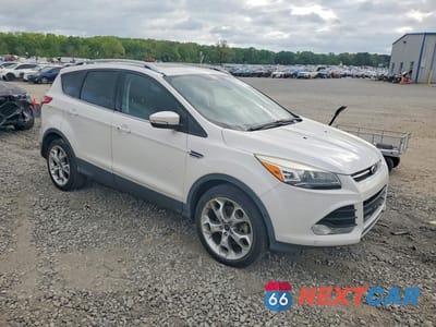 Czwarte zdjęcie samochodu z boku: 2014 FORD ESCAPE TITANIUM VIN:1FMCU9J91EUE34085 - miniatura