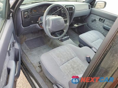 Zdjęcie 8 z 11 samochodu: 2000 TOYOTA TACOMA BASE VIN:5TEVL52N0YZ706397 - miniatura