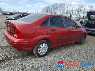 Trzecie zdjęcie samochodu z tyłu: 2004 FORD FOCUS LX VIN:1FAFP33P14W132192 - miniatura