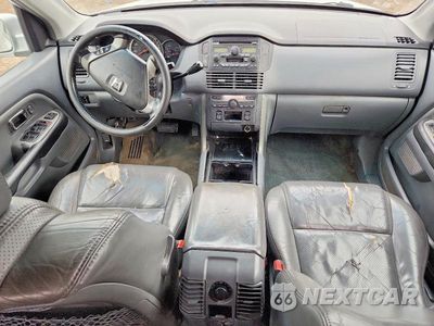 Zdjęcie 8 z 13 samochodu: 2004 HONDA PILOT EXL VIN:2HKYF18524H585504 - miniatura