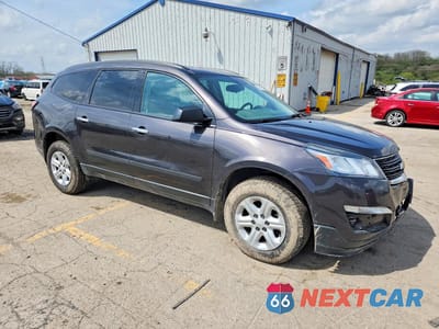Czwarte zdjęcie samochodu z boku: 2014 CHEVROLET TRAVERSE LS VIN:1GNKRFKD7EJ319177 - miniatura