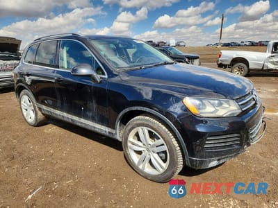 Czwarte zdjęcie samochodu z boku: 2013 VOLKSWAGEN TOUAREG V6 VIN:WVGDF9BPXDD010849 - miniatura