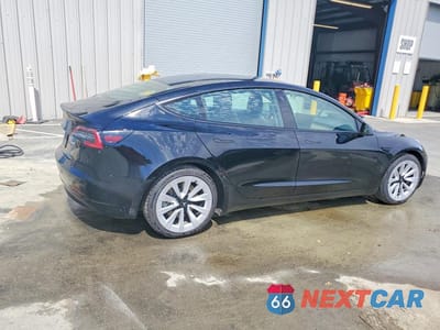 Trzecie zdjęcie samochodu z tyłu: 2022 TESLA MODEL 3 VIN:5YJ3E1EA9NF287160 - miniatura