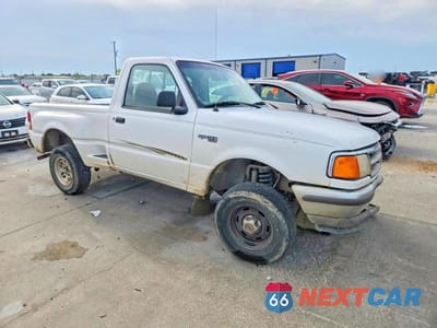 Czwarte zdjęcie samochodu z boku: 1997 FORD RANGER VIN:1FTCR10A1VPA98682 - miniatura