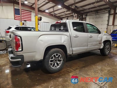 Trzecie zdjęcie samochodu z tyłu: 2018 GMC CANYON SLE VIN:1GTG6CEN7J1156678 - miniatura
