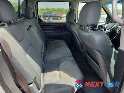 Zdjęcie 10 z 12 samochodu: 2008 HONDA RIDGELINE RTX VIN:2HJYK16368H519786 - miniatura