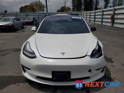 Piąte zdjęcie samochodu w środku: 2021 TESLA MODEL 3 VIN:5YJ3E1EA2MF853819 - miniatura