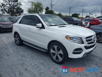 Czwarte zdjęcie samochodu z boku: 2016 MERCEDES-BENZ GLE 350 VIN:4JGDA5JB2GA772253 - miniatura