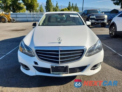 Piąte zdjęcie samochodu w środku: 2015 MERCEDES-BENZ E 250 BLUETEC VIN:WDDHF0EB4FB129714 - miniatura