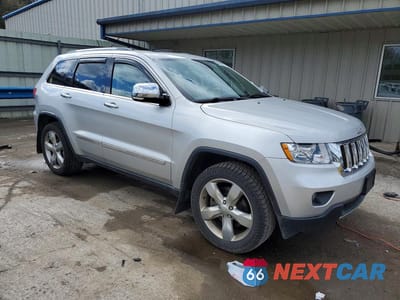 Czwarte zdjęcie samochodu z boku: 2012 JEEP GRAND CHEROKEE OVERLAND VIN:1C4RJFCT3CC203402 - miniatura
